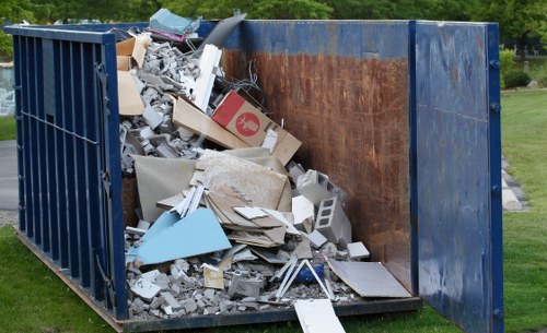 Professional garden clearance team at work in Shepherdsbush